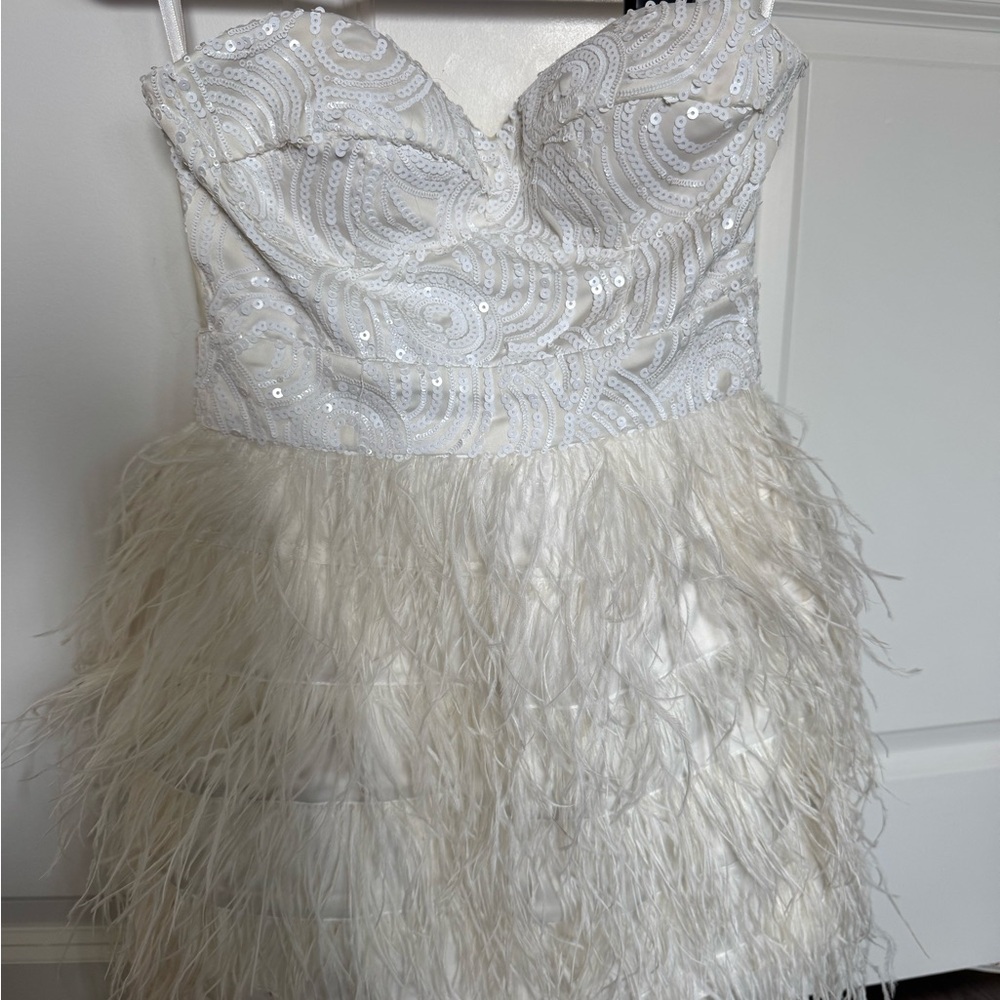 Bebe White Feathered mini dress